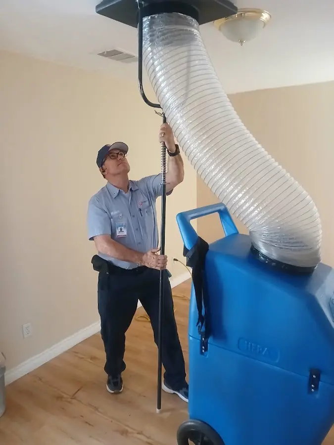 Mini Split Installation technician using HEPA equipment in Lansing